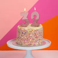 Vela numerada rosa dourada com glitter